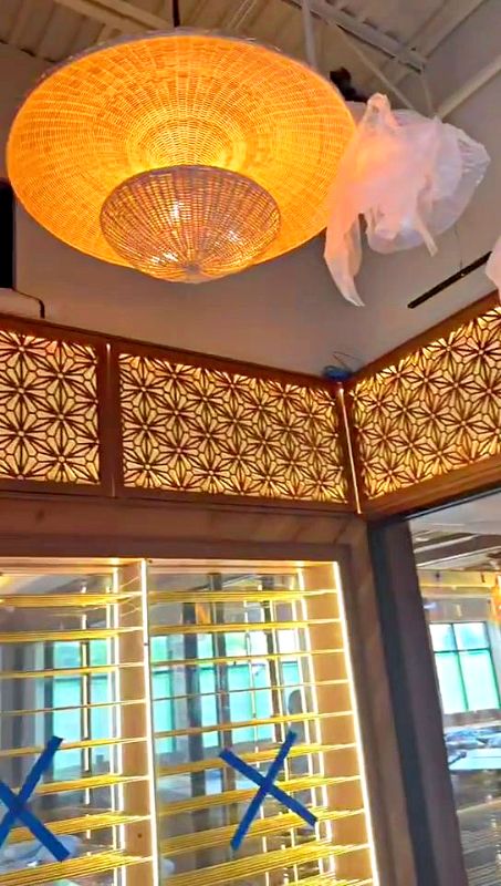Short video walking past the lit screens and into the dining room